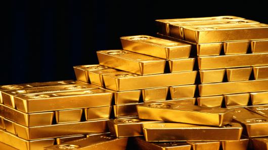 Gold up on softer dollar; India budget eyed
Gold edged up for a second session on Thursday as the dollar weakened after minutes of the Federal Reserve's recent policy meet gave no indication of when U.S. interest rates will rise.
Markets were also eyeing developments in India, the world's No.2 gold consumer after China, where the new government is expected to cut a record high import duty on the precious metal at the fiscal budget to be presented later in the day.
Spot gold rose 0.3 percent to $1,329.45 an ounce by 0332 GMT, after gaining 0.5 percent in the previous session, aided by the dollar that hit a one-week low against a basket of major currencies.
Read More These 3 charts tell you to buy gold: Top pro
A weaker dollar makes commodities priced in the greenback attractive for holders of other currencies.
Gold had come under pressure after last week's strong U.S. jobs report that stoked speculation of an early hike in rates, but the Federal Reserve gave no such indications, according to the minutes from the June meeting.
Higher rates would encourage investors to withdraw money from non-interest-bearing assets such as gold.
"If gold can break resistance at $1,335, then it can go all the way to $1,380," said a precious metals trader. "The weaker dollar after the Fed minutes is helping."