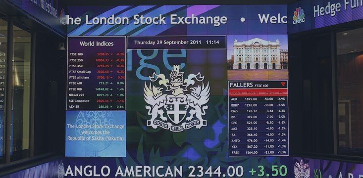 London's FTSE up, gold declines