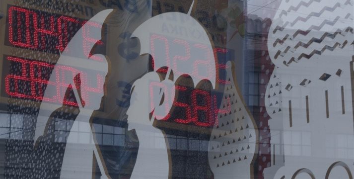 Russia's central bank cuts rates as ruble crisis recedes