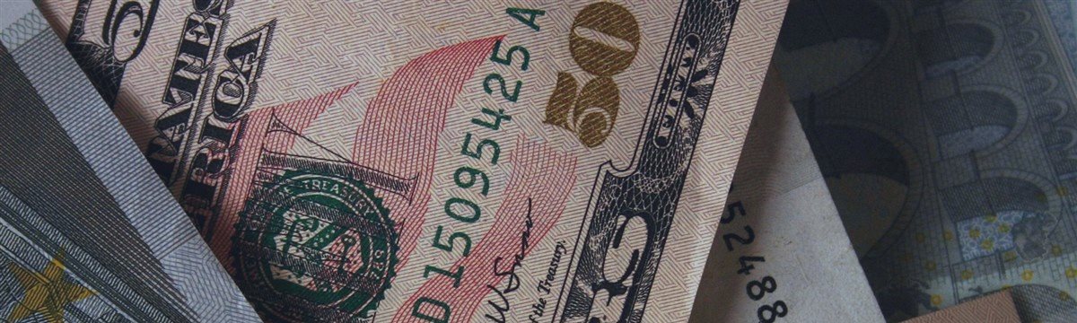 Dollar sharply up, as markets digest Fed's statement