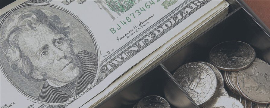 Dollar edges higher after strong US reports