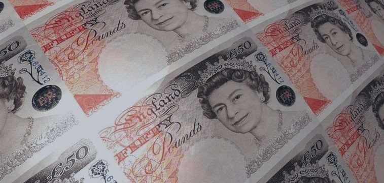 Pound touches one-week low versus dollar after disapponting UK data