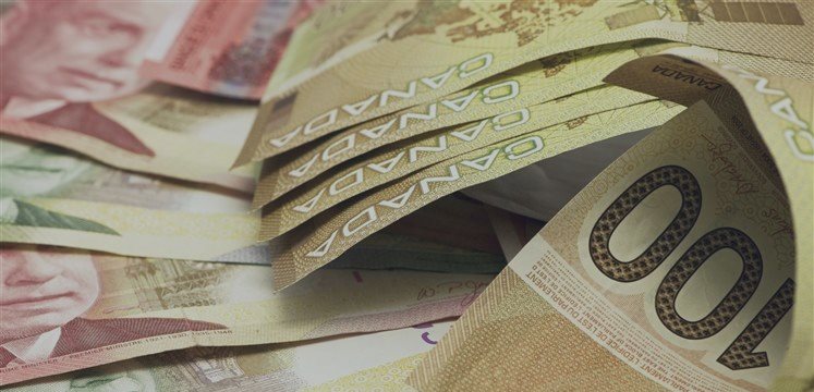 Loonie higher vs greenback and euro in early trade