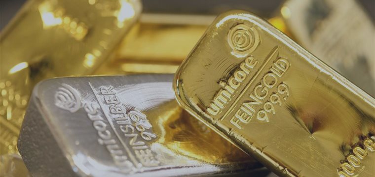 Gold trims losses as US GDP disappoints; FOMC eyed