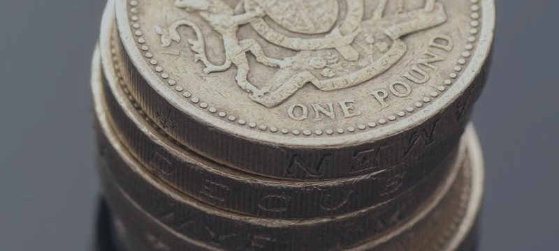 Pound hits session peak after fresh U.K. data; British bonds dip