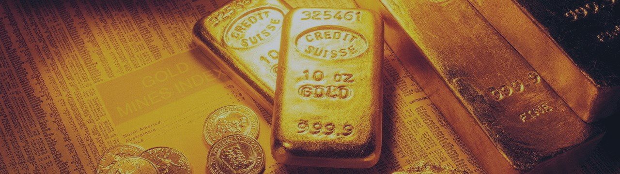 Золото снижается в пятницу на сильной американской статистике