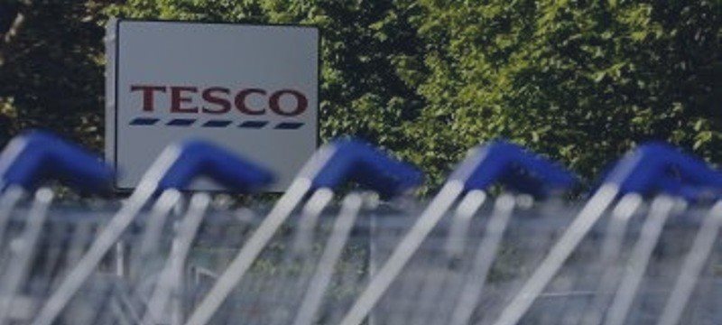 Britain's Tesco reports improvements despite sales drop