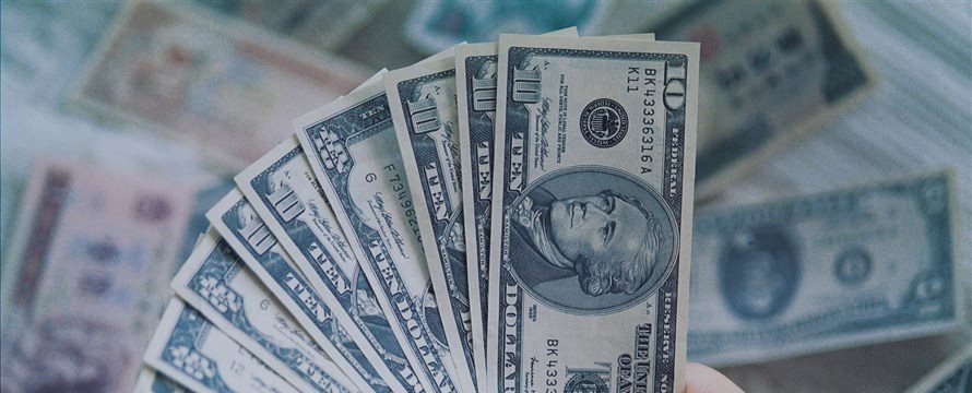 Dollar surges on positive ADP report; data on manufacturing activity ahead