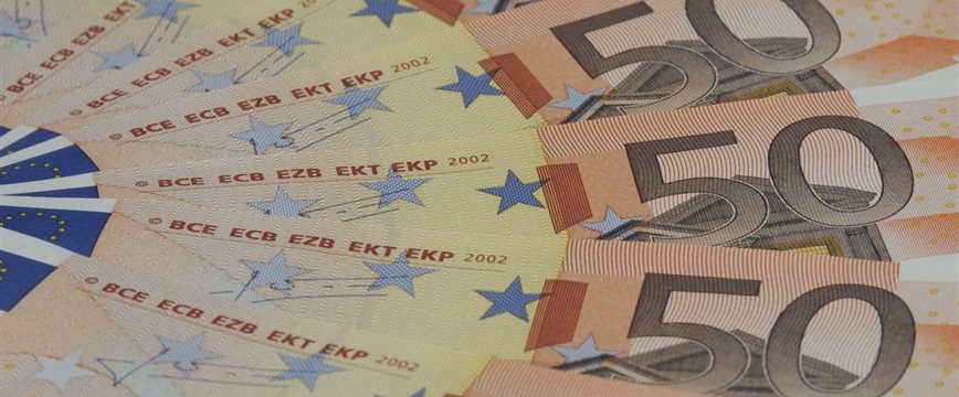 Euro slightly higher after Greece approves further EU demands
