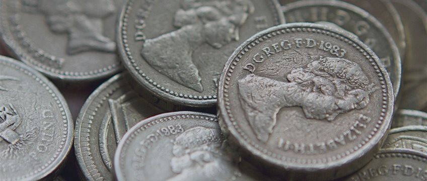 Sterling surges as U.K. wage growth hits six-year highs