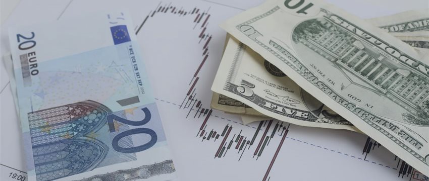 Dollar lower despite strong economic reports