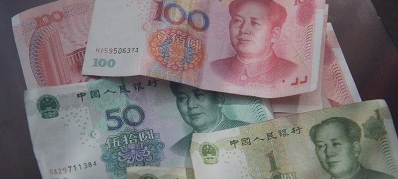Мнение: Необходимо ослабить юань на 40% к доллару